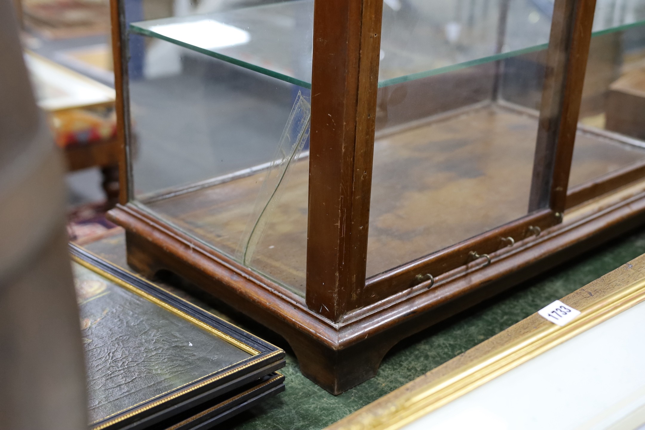 A late Victorian / Edwardian mahogany Fry’s Chocolates counter shop display cabinet with gilded lettering, width 81cms, depth 47cms, height 77cms.